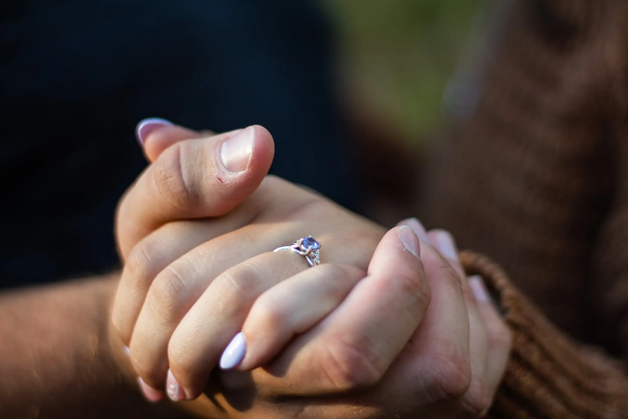 the couple proposal engagement ring